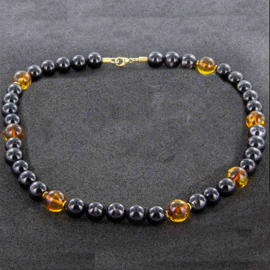 Moderne Bernsteinkette mit Obsidian und Silber