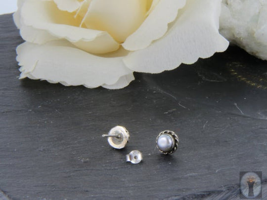 Echte Perle mit feiner Silberrosette, 925er Silber