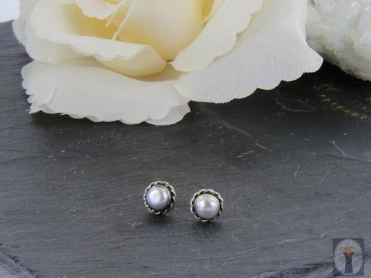 Echte Perle mit feiner Silberrosette, 925er Silber